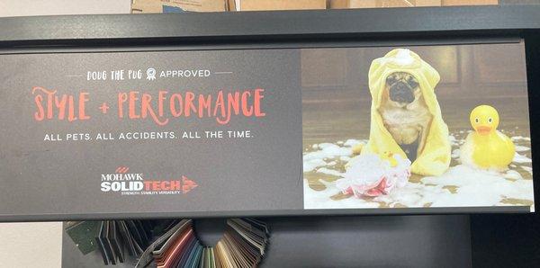 We carry Mohawk Solid Tech flooring--approved by Doug the Pug!