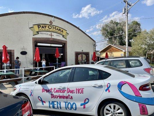 The "Marlyn Mobile" spreading awareness about male breast cancer in front of the Pat O'Hara Brewing Company.