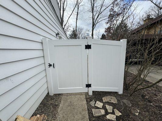 Fence gate opening over my cement walkway!