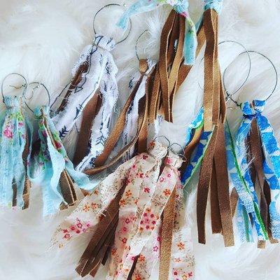 These handmade fringe earrings are an adorable artsy accessory. Made out of vintage fabrics and leather, they are each unique and very boho!