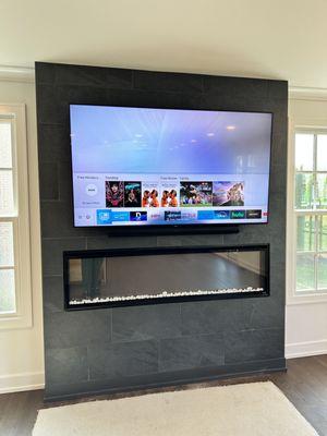 TV over tile fireplace