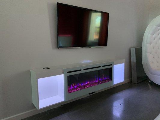 Custom Floating Entertainment center with Fireplace.