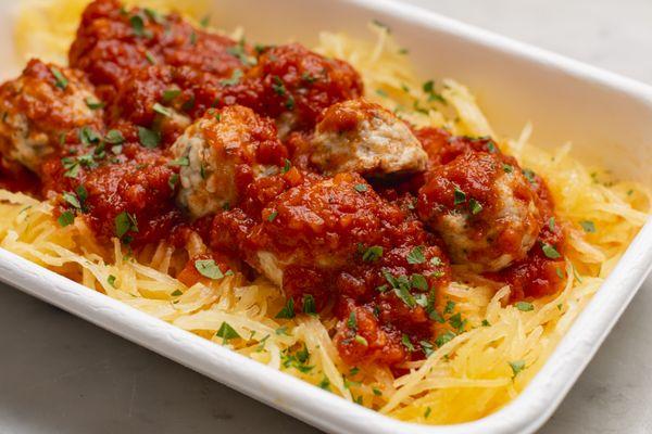 "SPAGHETTI & MEATBALLS"
 chicken meatballs, spaghetti squash, tomato marinara, cashew-garlic "parmesan"