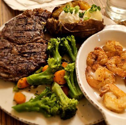 Ribeye Steak with Loaded Baked Potato and Grilled Shrimp. WOW!