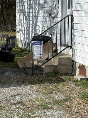 Yes, there is handicap parking ... but steps both side and front.