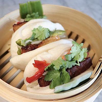 Pork Bao Buns - Lemongrass scented pork, braised, roasted, fried crispy, atchara, and roasted shallot mayo