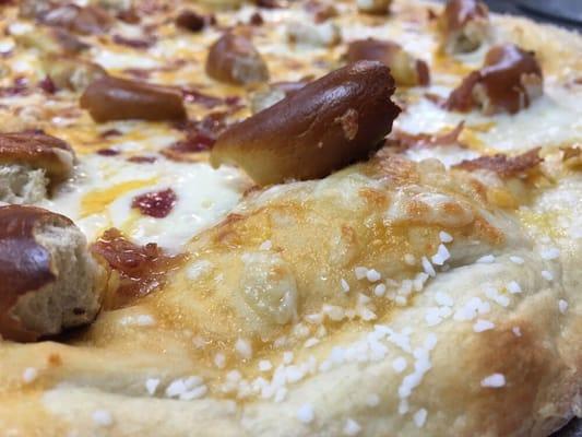 Pretzel and corona beer cheese  with bacon pizza