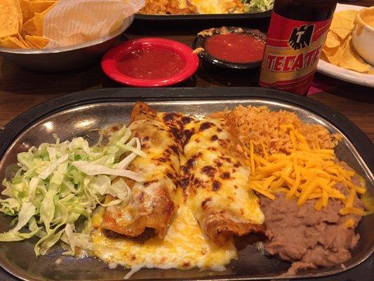 Enchiladas rice and beans.