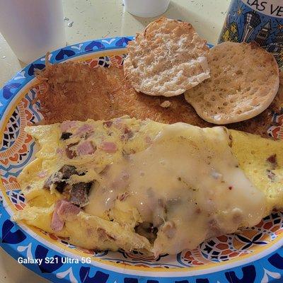 Meat lovers Omelet with hash browns and English Muffin. YUMMY!