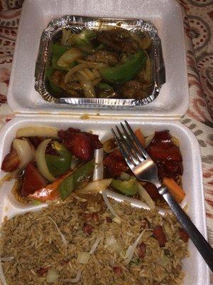 Bourbon chicken w. Pork fried rice lunch special and a Pint of pepper steak with onion.