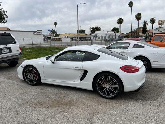 Porsche getting a smog check.