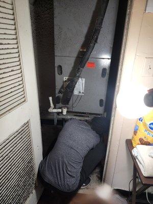 Inspection of Air Handler coil. Not an easy position but we do it so you don't have to.