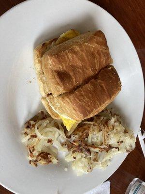 Sausage and gouda cheese with egg on a croissant - excellent!