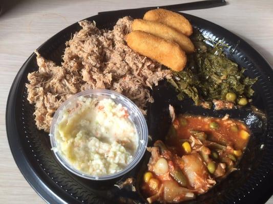 Large BarBQ plate with slaw, Brunswick stew, collars and hush puppies