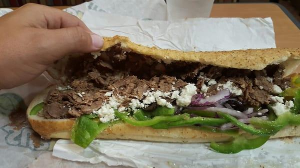 Steak and cheese "feta" on Italian herb and cheese