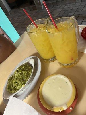 cheese dip, guacamole, mango drinks