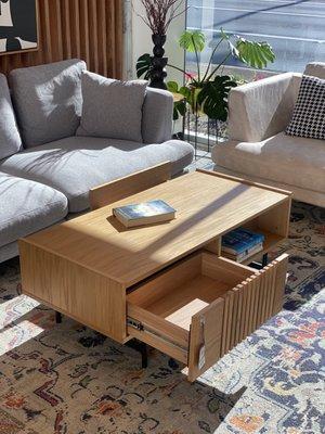 Sleek and multifunctional, the Valmar coffee table is the perfect piece to elevate your space!