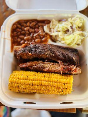 1 meat (ribs), coleslaw, cowboy beans and corn on the cob (with their spicy bbq sauce). SO GOOD and tender!