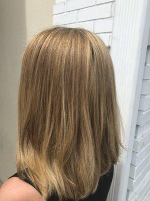 Beautiful golden blonde. Dimensional highlights that bring out the overall tone.