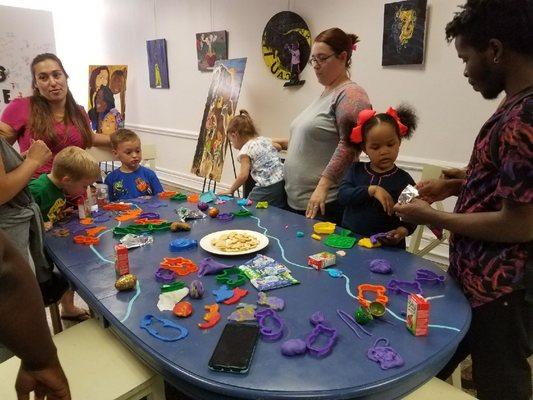 Getting messy with 0-4 year olds at our Play Doh party!