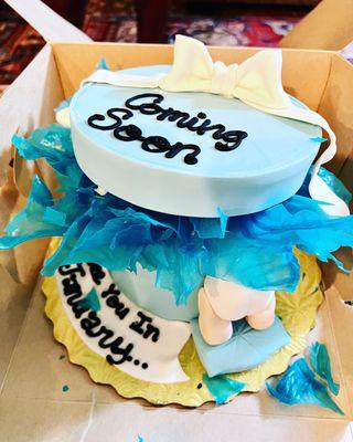 Pregnancy announcement cake