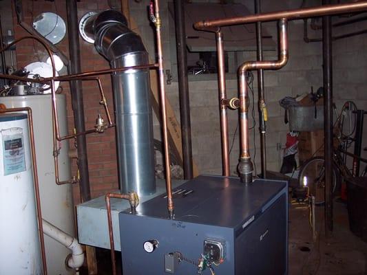 This is a boiler we installed recently at a 6-flat multi-family building in the Northern suburbs of Chicago...