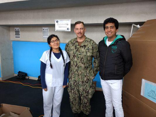 During a mission visiting 12 nations in 154 days, Dr. Abbott's team distributed 30,862 eyeglasses. Here with medical students in Lima, Peru.