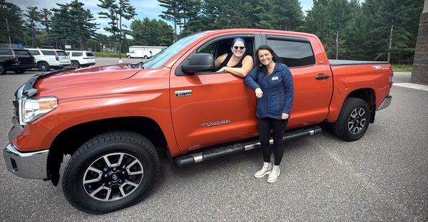 Sarah, our salesperson, my super happy truck driving wife and Nemo the Inferno Orange Tundra.