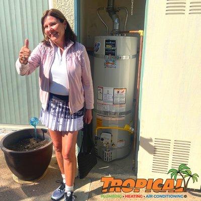 Happy for her new water heater!