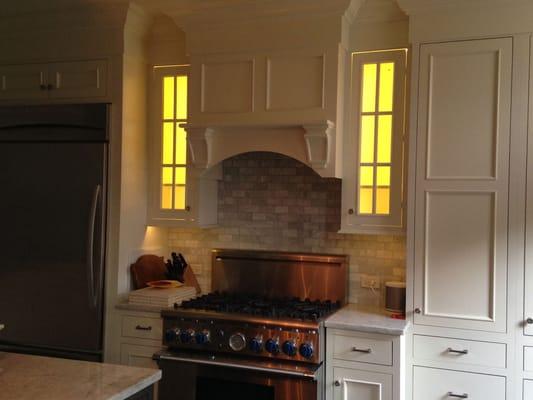 New LED in-cabinet and under-cabinet lighting in the kitchen of a vintage townhouse in the Lincoln Park neighborhood of Chicago