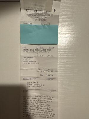 Paid over $3700 for my dress from Versace and Carriage Cleaners damaged it.