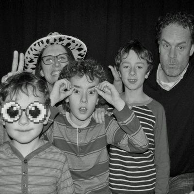 Family inside the Big Classic enclosed photo booth