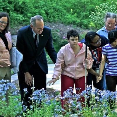 Residents exploring the fantastic sensory garden.