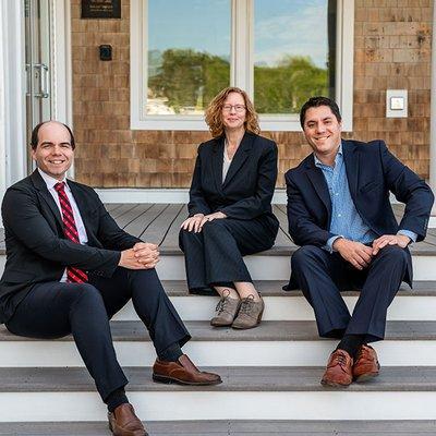 Attorney Long, Attorney Huff-Harris, and Attorney Hagan outside the firm's Duxbury office.