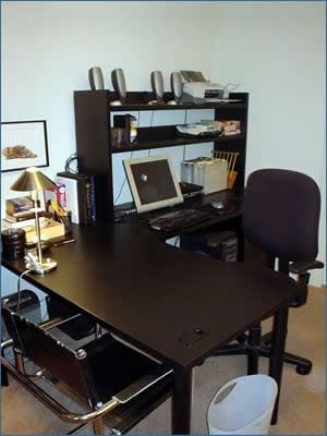 Newly-organized home office for a professional who works in multiple locations, with the home office as a base of operations.