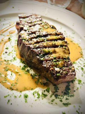 American Wagyu Strip Loin with green peppercorn sugo and patate fritte