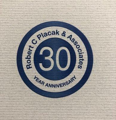 Robert C Placak & Associates 30 year anniversary logo designed, embossed and printed by Ram Print