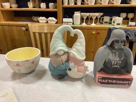 Cereal bowl, a gnome and a snowman, and dark Vader piggy bank