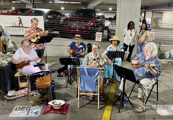 Today Market shoppers are serenaded by a band of ukuleles!