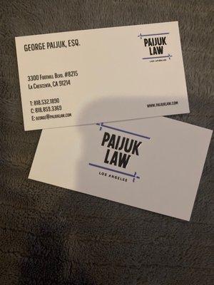 Business cards, including contact information.