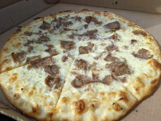 White pizza with sausage