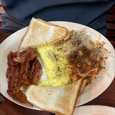 2. 2 eggs, hash browns, toast and jelly with bacon.