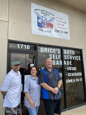 James, Naomi, Steven outside of office.