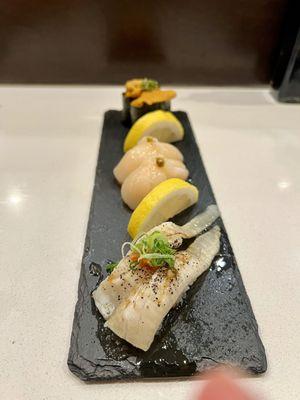 Halibut fin, scallops, uni sushi.