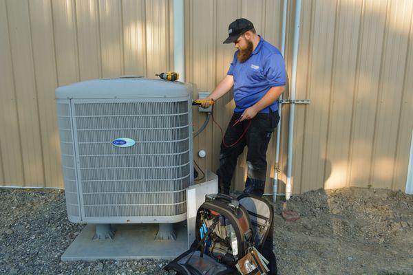 Technician working on HVAC Tune-up