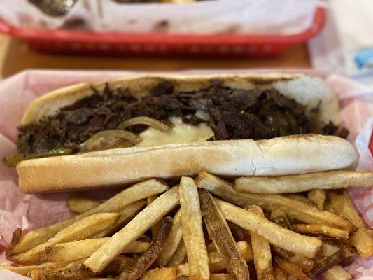 Philly Cheesesteak Sandwich with fries