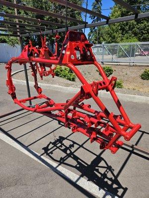 Predator 500 frame done in Illusion Red with a glossy clear