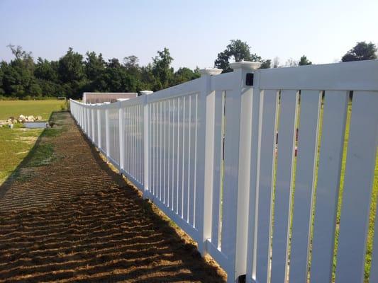 Completed installation of a customer's new vinyl fence!