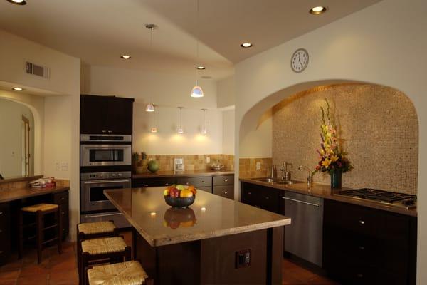 AWESOME KITCHEN WITH MOSAIC STONE BACKSPLASH, HIDDEN VENTING AND SMOOTH, ROUNDED LINES