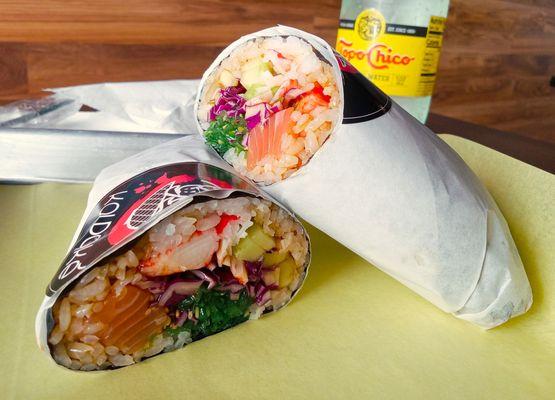 Superb sushi burrito. Crab, salmon, red cabbage and seaweed salad!